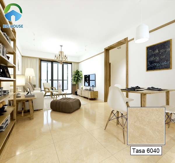 Mẫu gạch vân đá Tasa 6040 kích thước 60x60 sở hữu gam màu vàng kem lát nền phòng khách rất ưa nhìn.